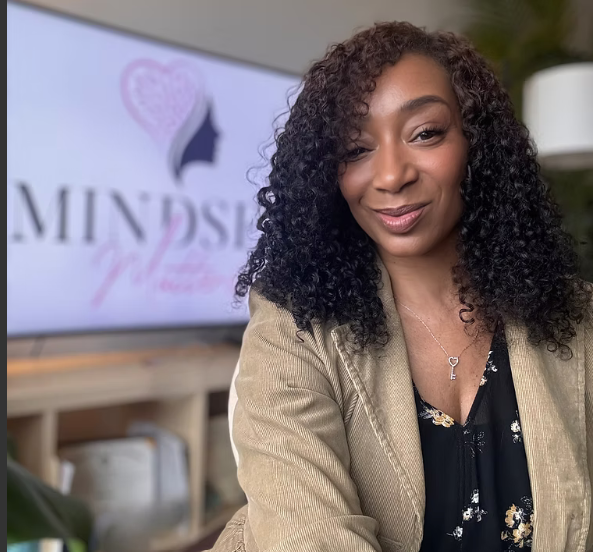 Bleu Winters in a beige blazer with Mindset Matters branding in the background